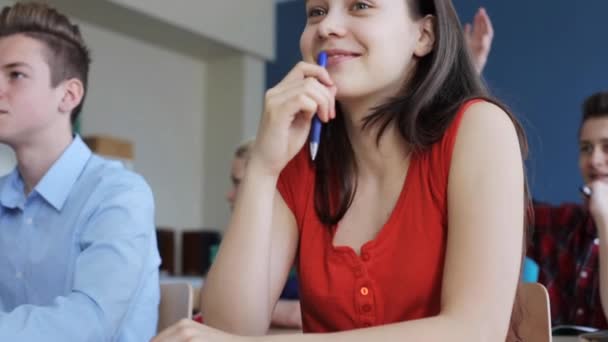 Students with notebooks on lesson at school — Stock Video