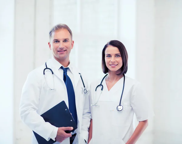 Two doctors with stethoscopes — Stock Photo, Image