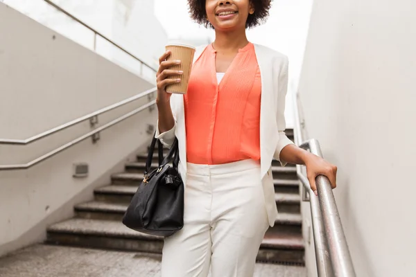 Close up of african businesswoman with coffee — Stock Photo, Image