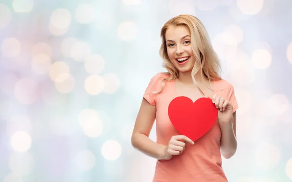 Happy woman or teen girl with red heart shape — Stock Photo, Image