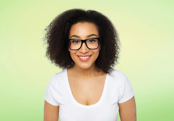 Happy african woman or student girl in eyeglasses — Stock Photo, Image