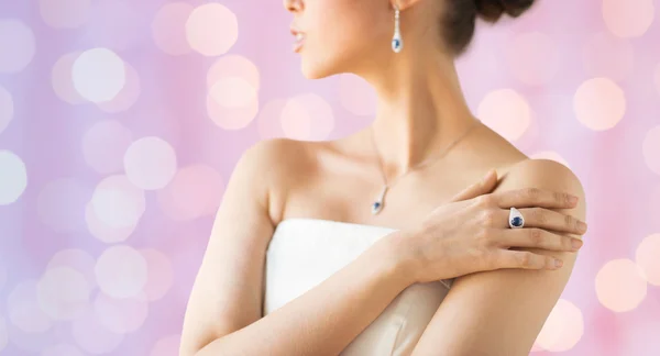 Close up of beautiful woman with finger ring — Stock Photo, Image