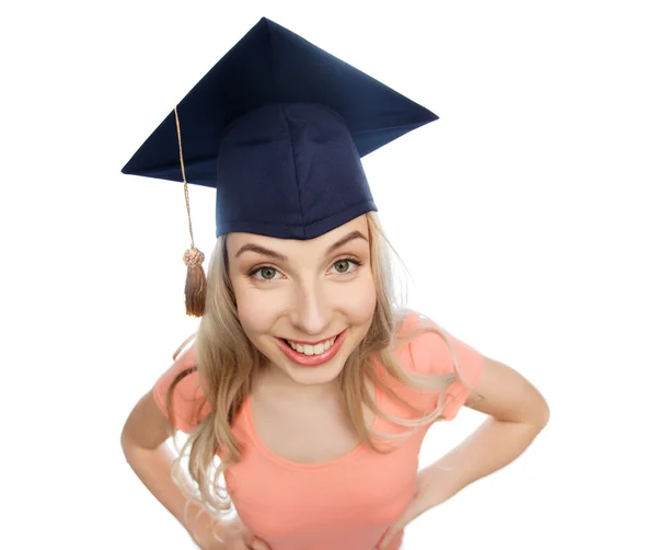 Smiling young student woman in mortarboard — Stock Photo, Image