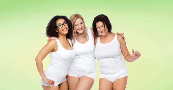Grupo de mujeres felices más tamaño en ropa interior blanca —  Fotos de Stock