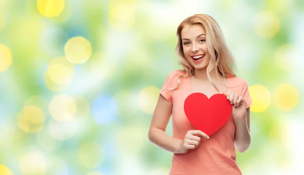 Happy woman or teen girl with red heart shape — Stock Photo, Image