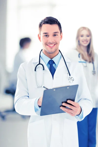 Male doctor writing prescription Stock Image