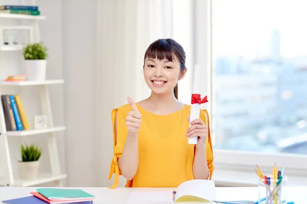 Happy asian woman student with diploma at home — Stock Photo, Image