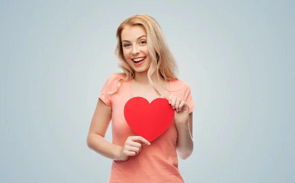 Mujer feliz o chica adolescente con forma de corazón rojo —  Fotos de Stock