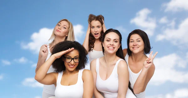 Group of happy women in white underwear having fun — Stock Photo, Image