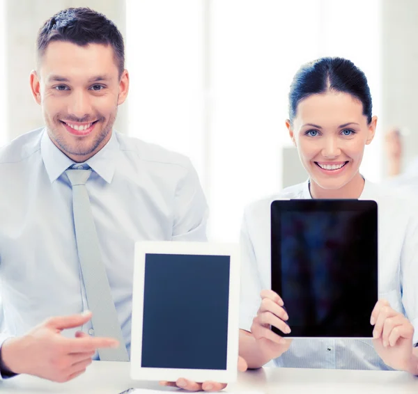 Business team showing tablet pcs — Stock Photo, Image
