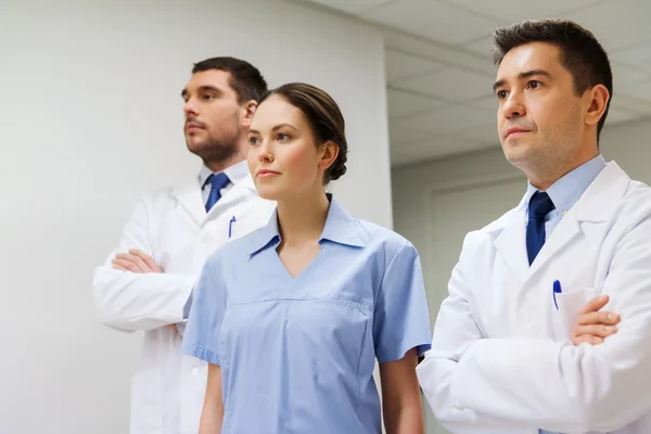 Group of medics or doctors at hospital — Stock Photo, Image