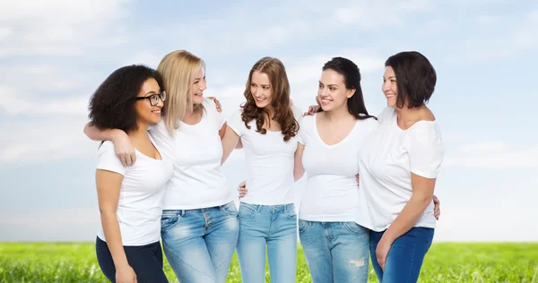 Group of happy different women in white t-shirts — Stock Photo, Image