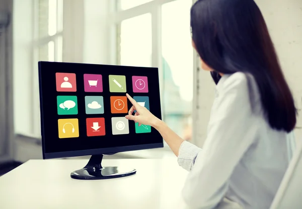 Close up of woman with apps on compute — Stock Photo, Image
