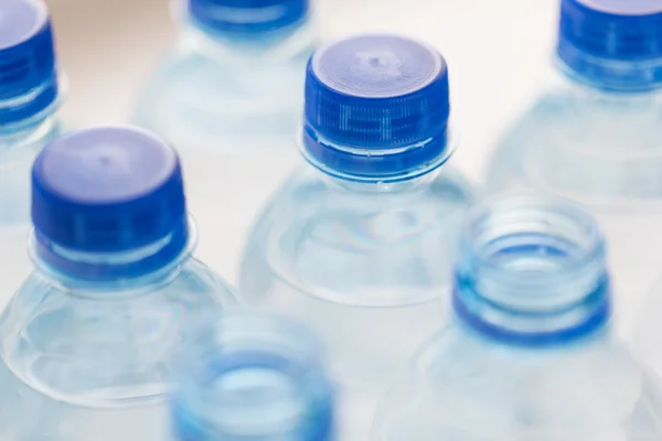 Plastic bottles with drinking water — Stock Photo, Image