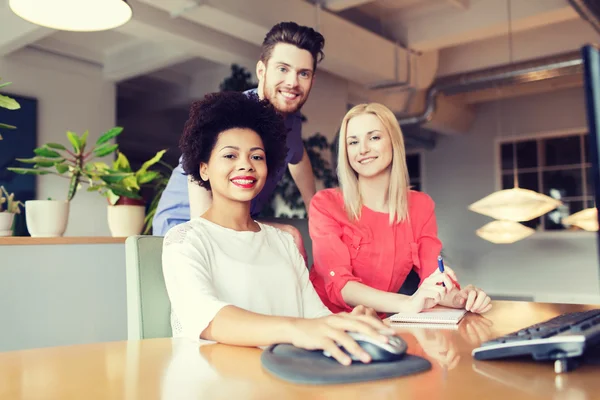 Happy creative team in office — Stock Photo, Image