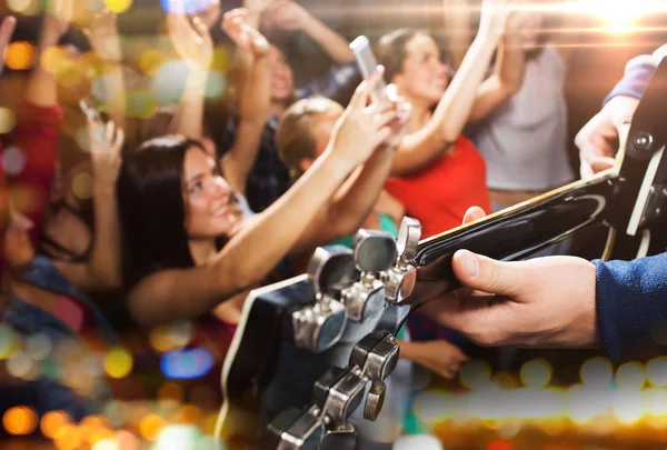 Close up of people at music concert in night club — Stock Photo, Image