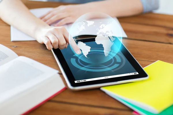 Close up of student with tablet pc and notebook — Stock Photo, Image