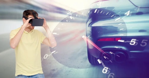 Man in virtual reality headset and car racing game — Stock Photo, Image