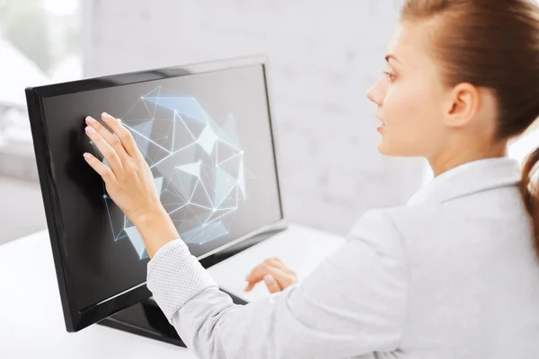 Businesswoman with projection on computer — Stock Photo, Image