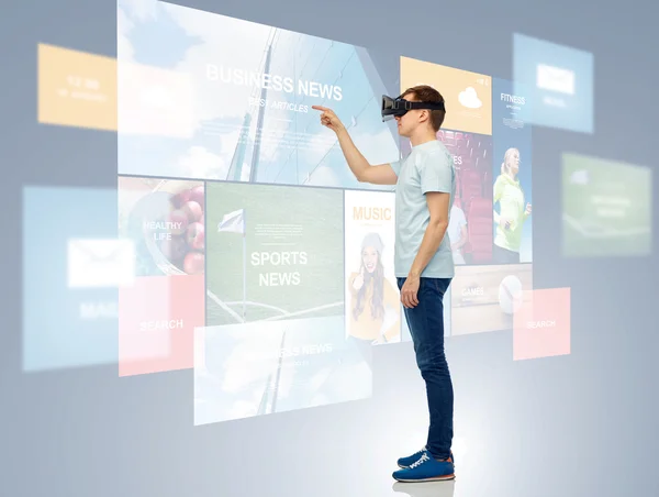Gelukkig man in virtuele werkelijkheid hoofdtelefoon of 3D-bril — Stockfoto