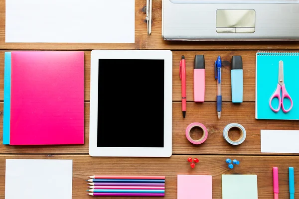 Close up of school supplies and tablet pc — Stock Photo, Image