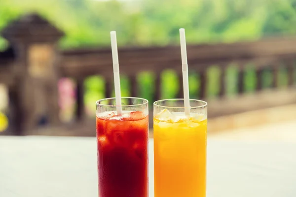 Glasses of fresh fruit juice at restaurant — Stock Photo, Image