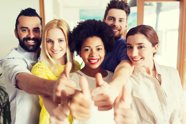 Happy creative team in office — Stock Photo, Image