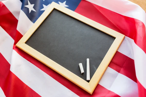 Close up of school blackboard on american flag — Stock Photo, Image