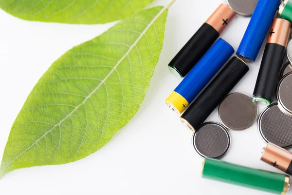 Close up of green alkaline batteries — Stock Photo, Image