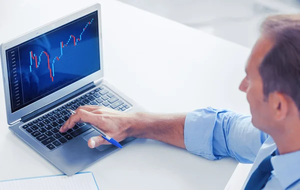 Businessman working with forex chart in office — Stock Photo, Image