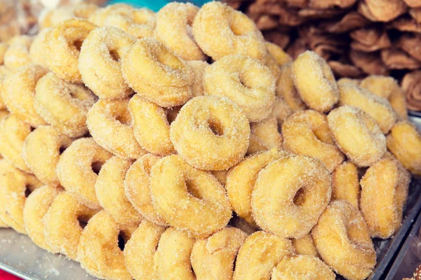 Sugared donuts at asian street market — Stock Photo, Image