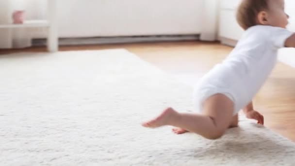 Happy little baby crawling in living room at home 3 — Stock Video