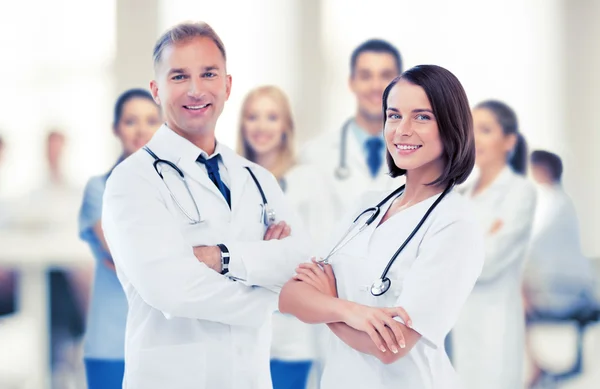 Two young attractive doctors — Stock Photo, Image