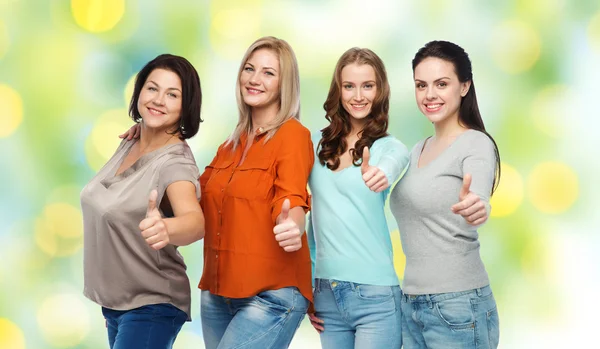 Group of happy different women showing thumbs up — Stock Photo, Image