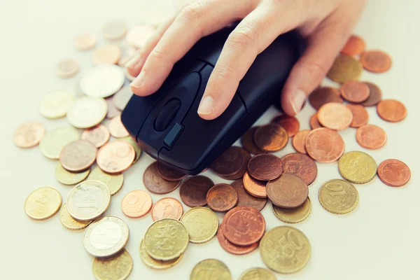 Close up of hand with computer mouse on money — Stock Photo, Image