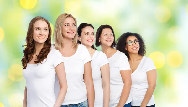 Group of happy different women in white t-shirts — Stock Photo, Image