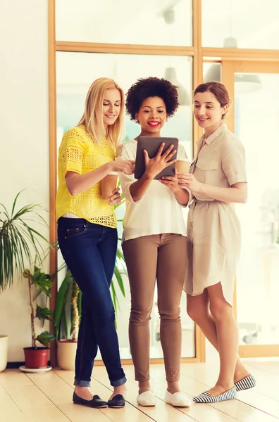 Creative team with tablet pc and coffee in office — Stock Photo, Image