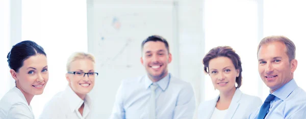 Friendly business team in office — Stock Photo, Image