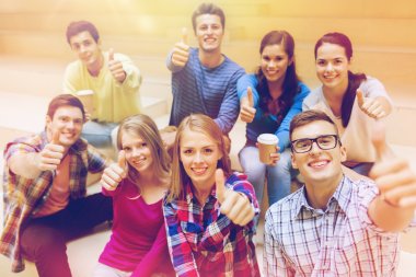 group of smiling students with paper coffee cups clipart