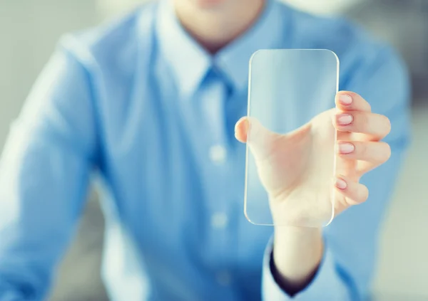 Närbild på kvinna med transparent smartphone — Stockfoto