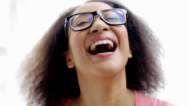 Happy african american young woman face laughing — Stock Video