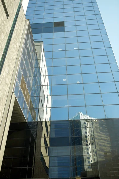 Close up of office building or skyscraper and sky — Stock Photo, Image