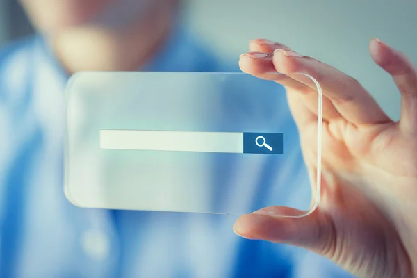 Primer plano de la mujer con teléfono inteligente transparente —  Fotos de Stock