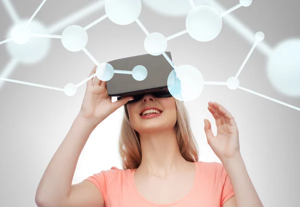Woman in virtual reality headset or 3d glasses — Stock Photo, Image