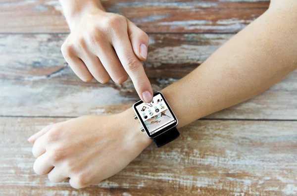 Close up of hands with online shop on smart watch — Stock Photo, Image