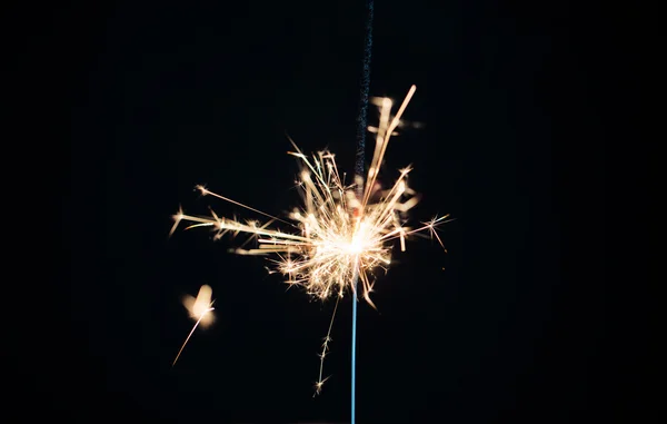 Bengala ardiendo sobre fondo negro —  Fotos de Stock