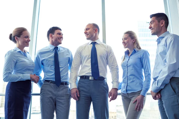Smiling businesspeople meeting in office — Stock Photo, Image