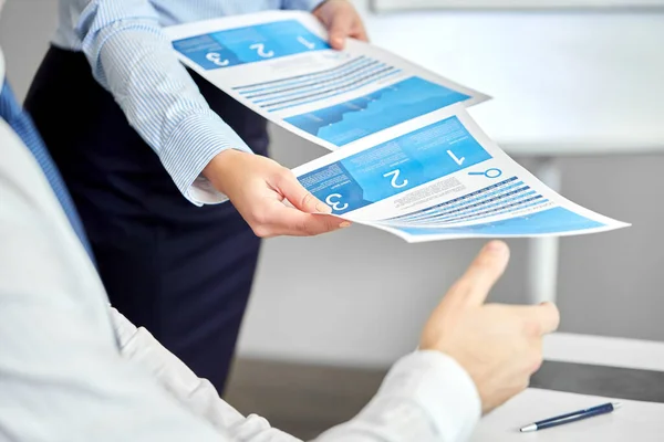 Close up of business team with papers at office — Stock Photo, Image