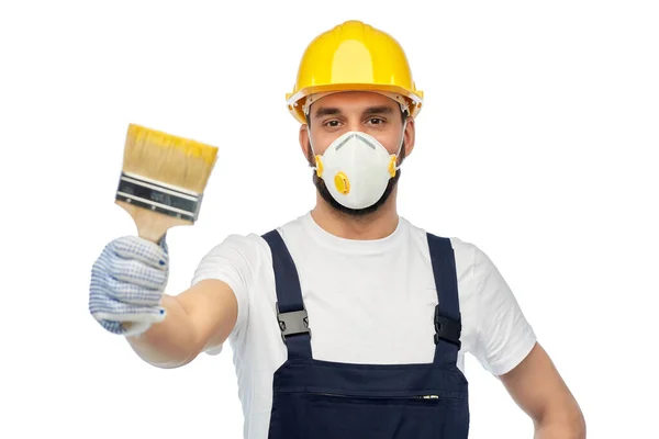 Arbetare eller byggare i respirator med pensel — Stockfoto