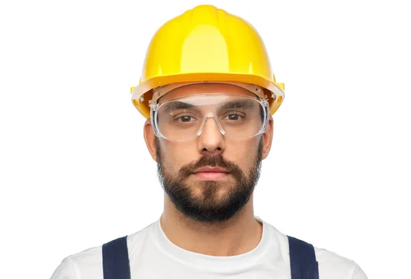 Male worker or builder in helmet and overall — Stock Photo, Image